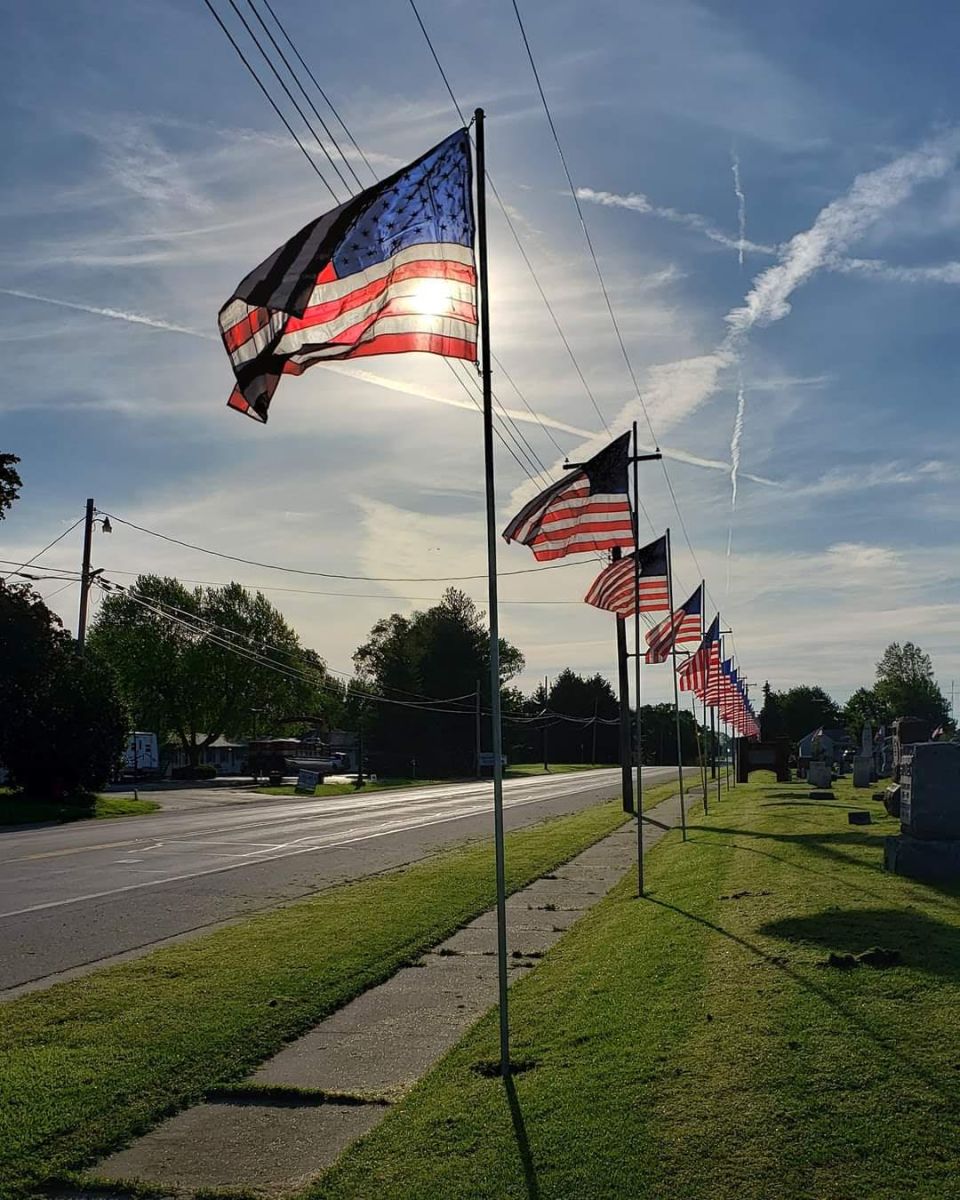 flags at cemetery